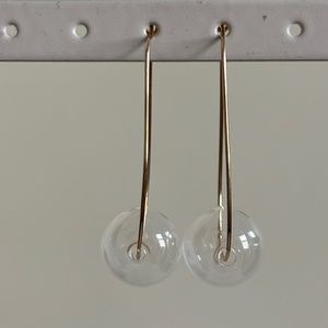 Super cute oval hoop earrings with glass bauble!